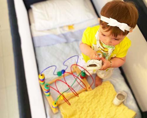 Girl in the playpen